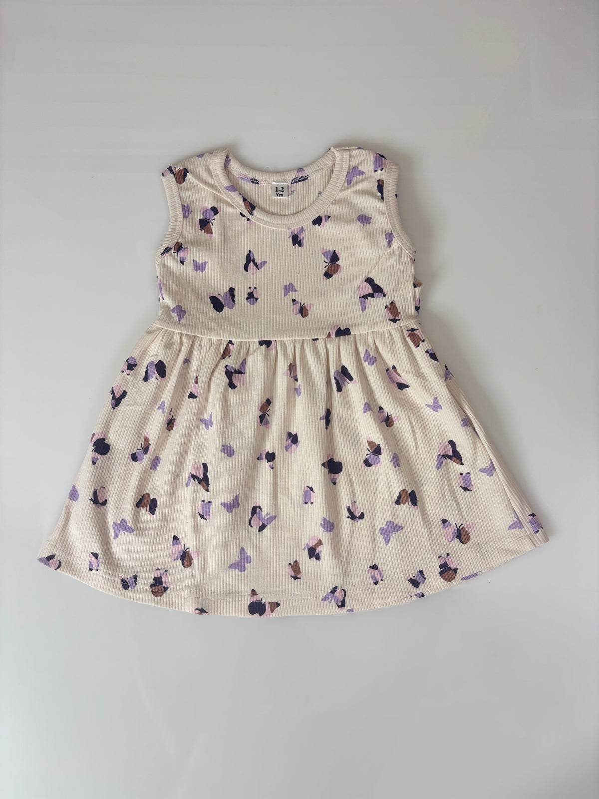 Lavender Sleeveless Frocks with Red Ribbon Design
