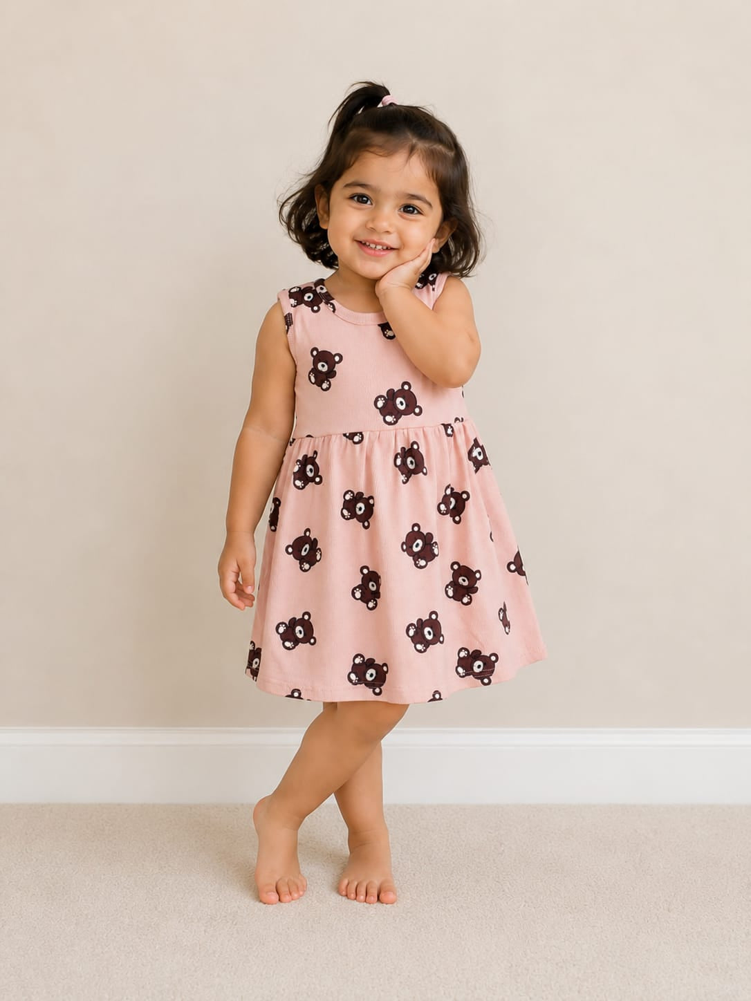 Light Pink Sleeveless Frocks with Black Teddy Design