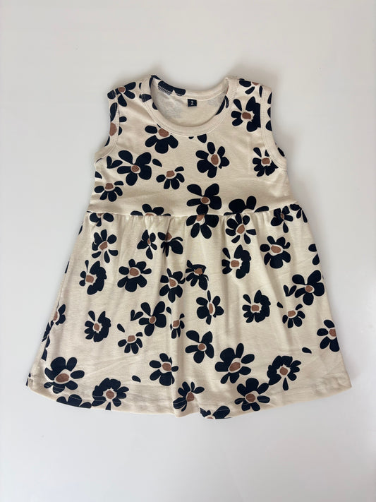 White Sleeveless Frocks with Black Flowers Design