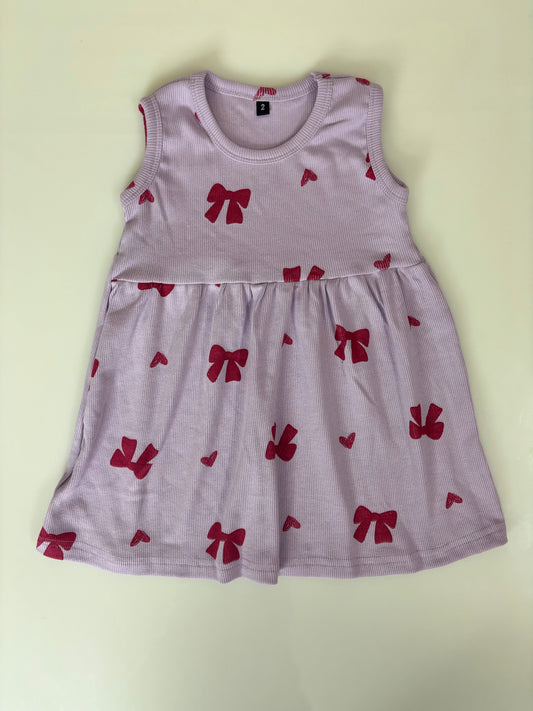 Light Pink Sleeveless Frocks with Red Ribbon Design