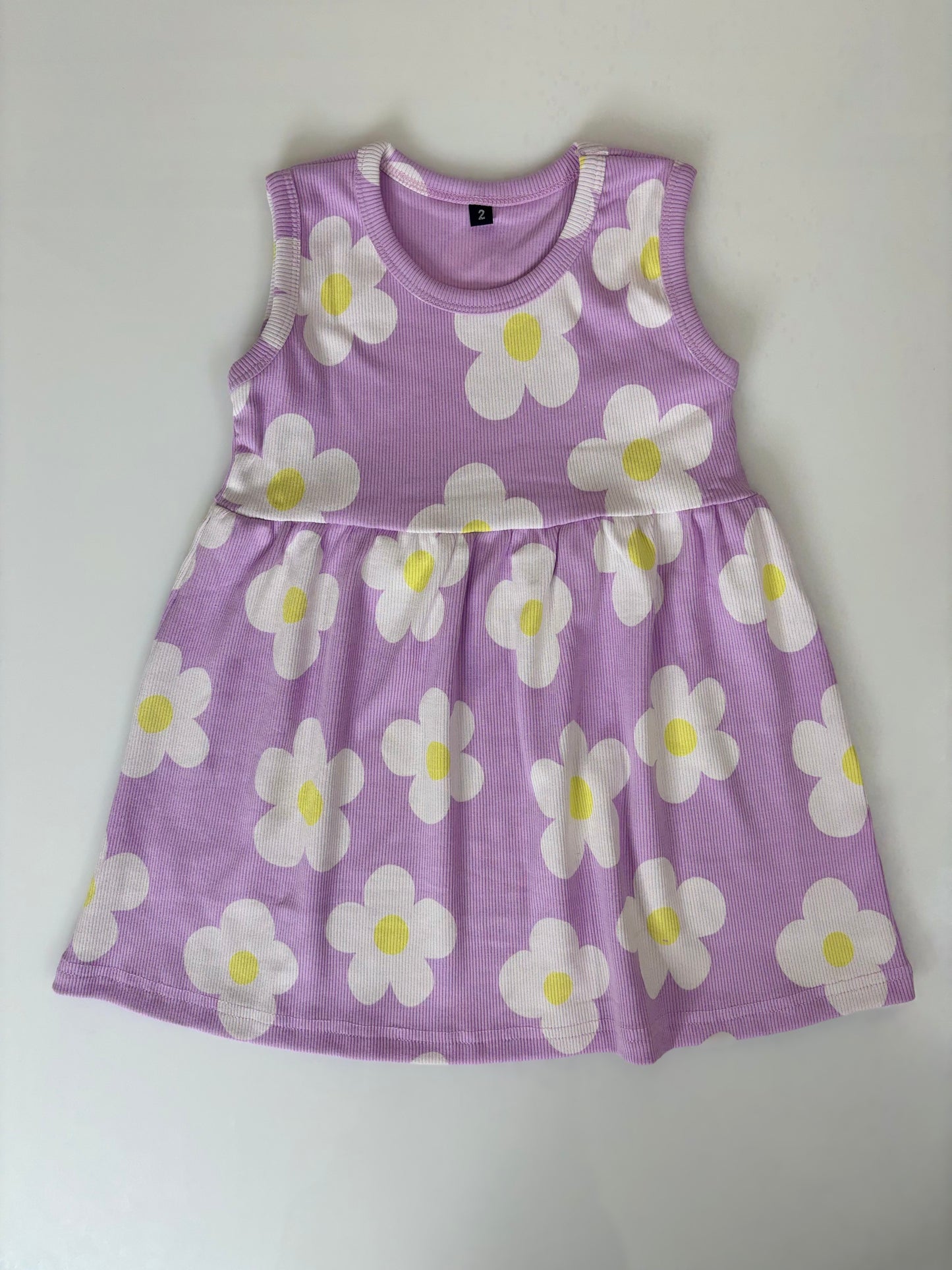 Lavender sleeveless frock with white daisy flowers