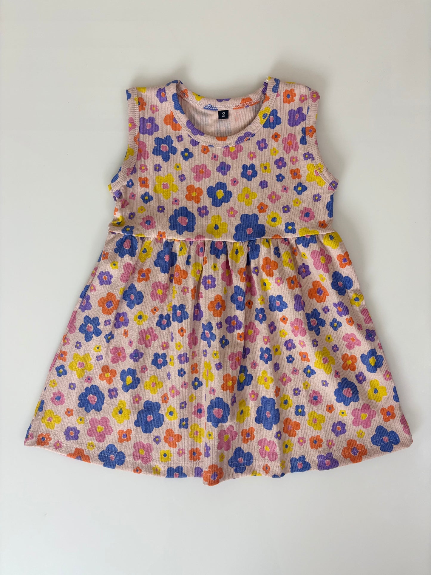 Pink Sleeveless Frocks with Colorfull Flowers Design