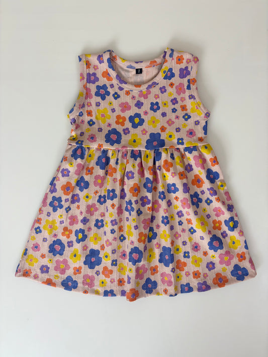 Pink Sleeveless Frocks with Colorfull Flowers Design