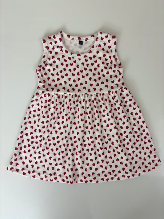 White Sleeveless Frocks with Red Heart Design